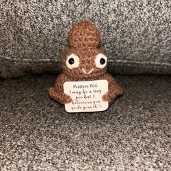 Positive Poo" crochet doll