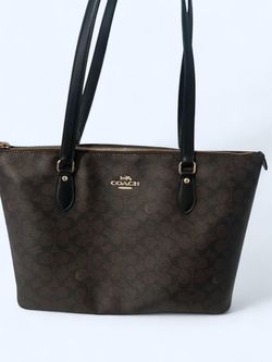 Coach brown & black tote bag with repeating monogram pattern