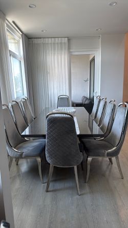 Dining room table and 10 chairs
