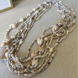 Set Of 7 Shell Necklaces 