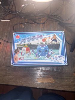 New YangnKids Inflatable Octopus Game featuring both a basketball hoop and a ring...