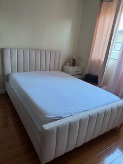 Blush pink bedframe, full-size