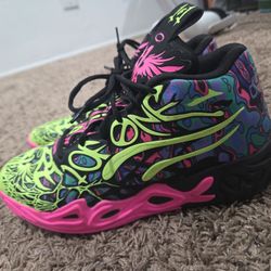 Puma x LaMelo Ball MB.04 Heem basketball shoes in the Black, Luminous Pink, and Electric Lime colorway. 