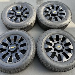 20” Chevy Silverado 2500 factory wheels and tires gloss black new 3500