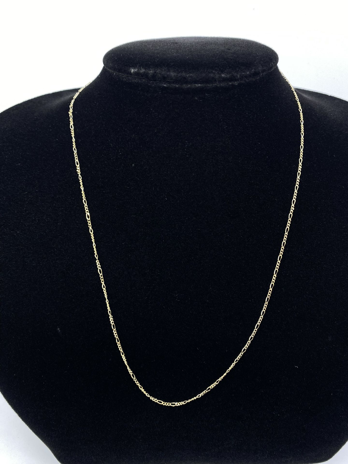$215 Yellow Gold Figaro Chain