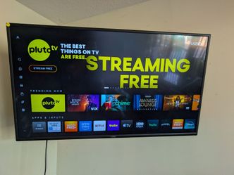 50" inch TV with a wall mount.