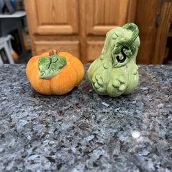 Vintage Ceramic Fall Theme Pumpkin And Gourd Pair of Salt and Pepper Shakers.  Size approximately Pumpkin 2 inches tall and Gourd 3 1/4 inches tall.  