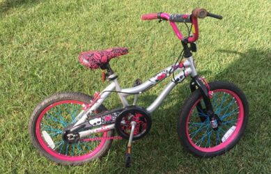 Monster high 18inch bike with training wheels. BASICALLY brand new