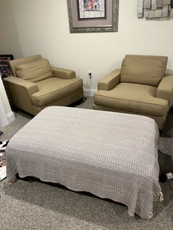 Comfortable chairs with ottomon