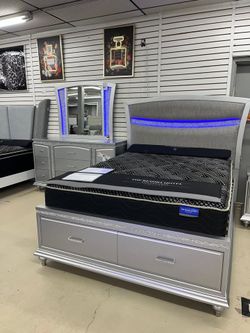 Sophisticated bedroom set features Premium Silver Finish w/led lights & Storage