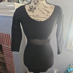 Bebe Black dress with fishnet back and front waist