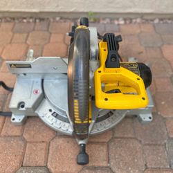 Selling a Dewalt 12” compound miter saw in good condition see all information