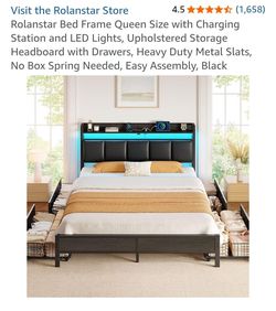 Queen size bed frame brand new with charging station in the Box never used .