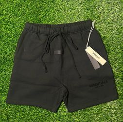 Black essentials fear of god shorts