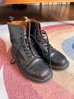 5 pairs of Dr Marten shoes and boots.