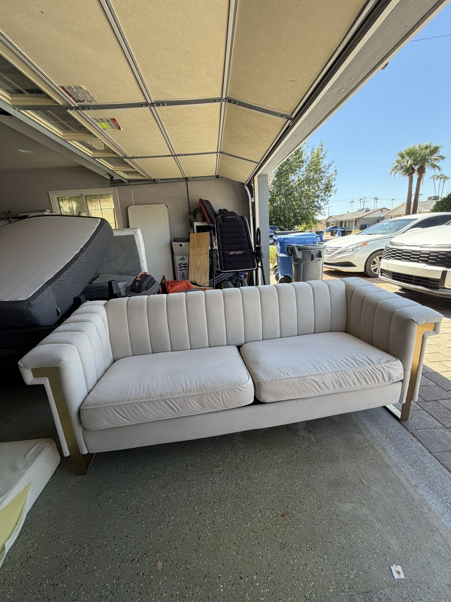 Cream Sofa with Gold Accents