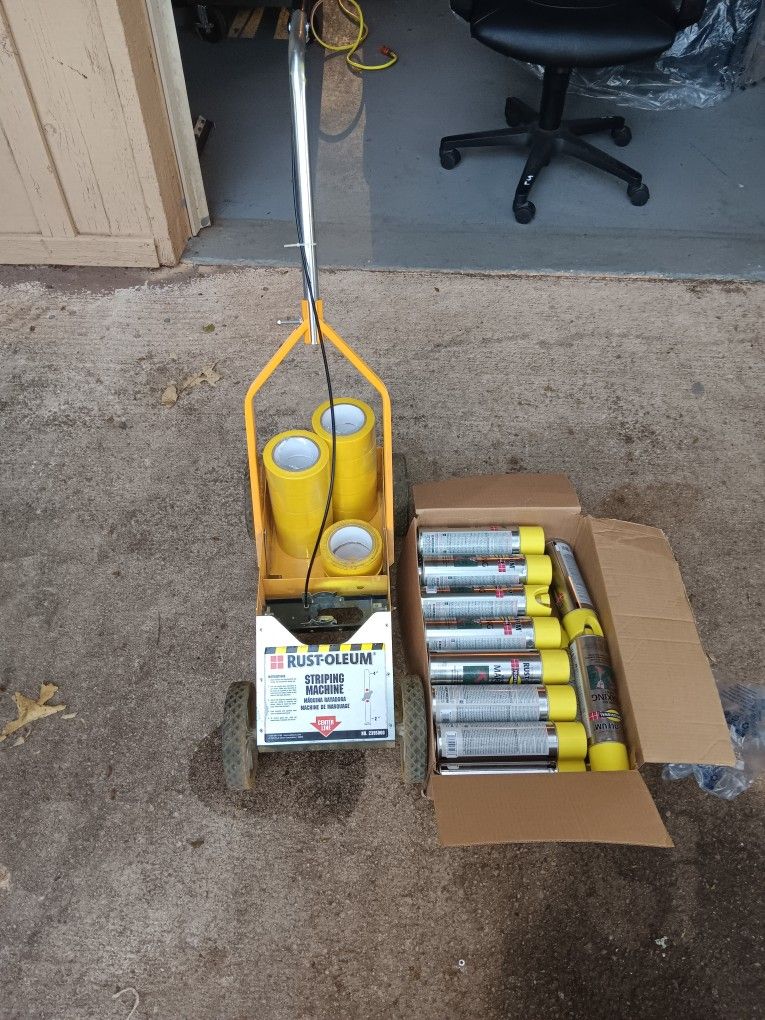 RUST-OLEUM STRIPING MACHINE.