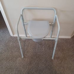 BATHROOM OR BEDSIDE CAMMODE( DRIVE)