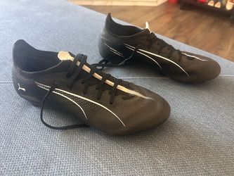 Puma adult men’s soccer cleats, size US9.