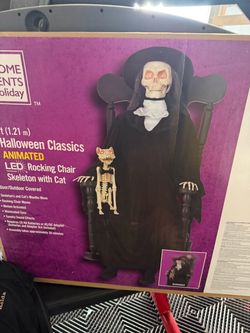 led rocking chair skeleton with cat