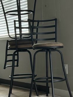 Three bar stools