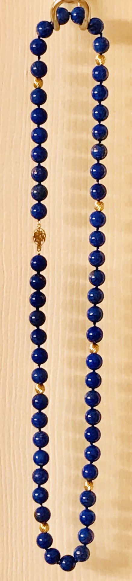 Lapis Lazuli and 14 K solid gold Necklace. Color is near perfect, 26” in length.