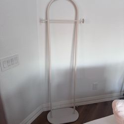 Small Clothing Rack Cream Colored W/Marble Base
