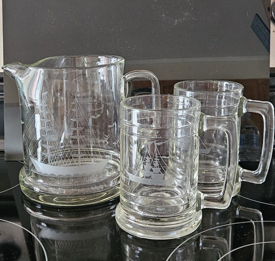 Vintage 6.5" Clear Glass Drink Pitcher with Etched Ships Sailboats Design and Set of 2 Matching Etched Mugs each with Thick Glass Bases. Heavy Glass S