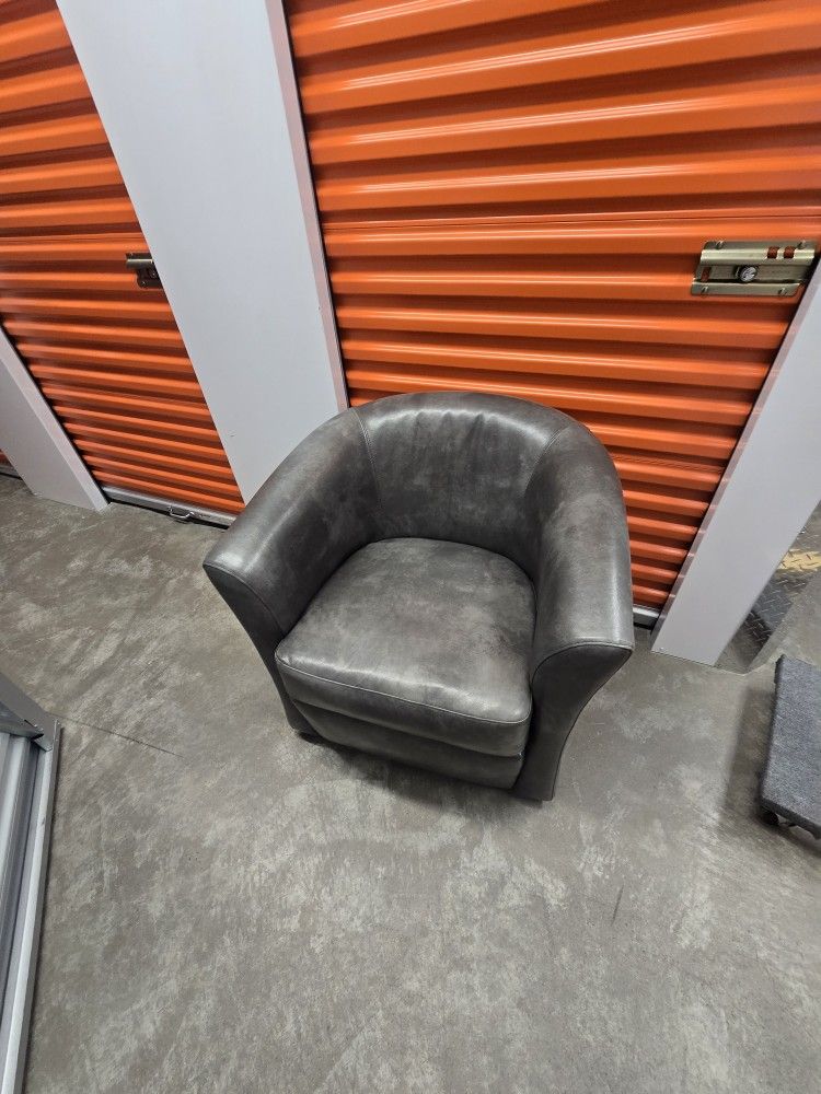 Dark Grey Leather Swivel Armchair