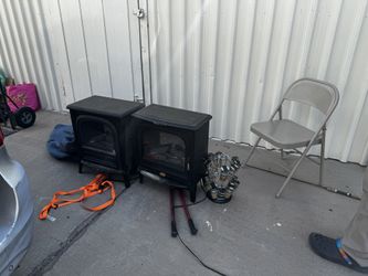 2 Plug In Fire Place $30 OBO