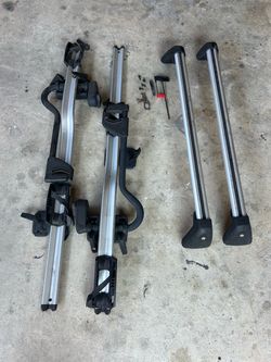 Genuine BMW Roof Rack system w/ two locking bike carrier mounts.