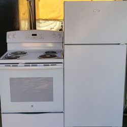 LIKE NEW REFRIGERATOR AND ELECTRIC STOVE,  FREE DELIVERY AND INSTALLATION,  30 DAYS WARRANTY 
