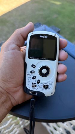 white and black Kodak PlaySport Zx3 HD waterproof pocket video camera
