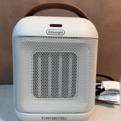 DeLonghi Up to 1500-Watt Ceramic Compact Personal Indoor Electric Space Heater with Thermostat