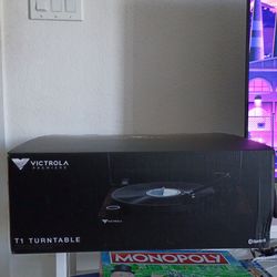 Brand new, open box UNUSED VICTROLA T1 TURNTABLE