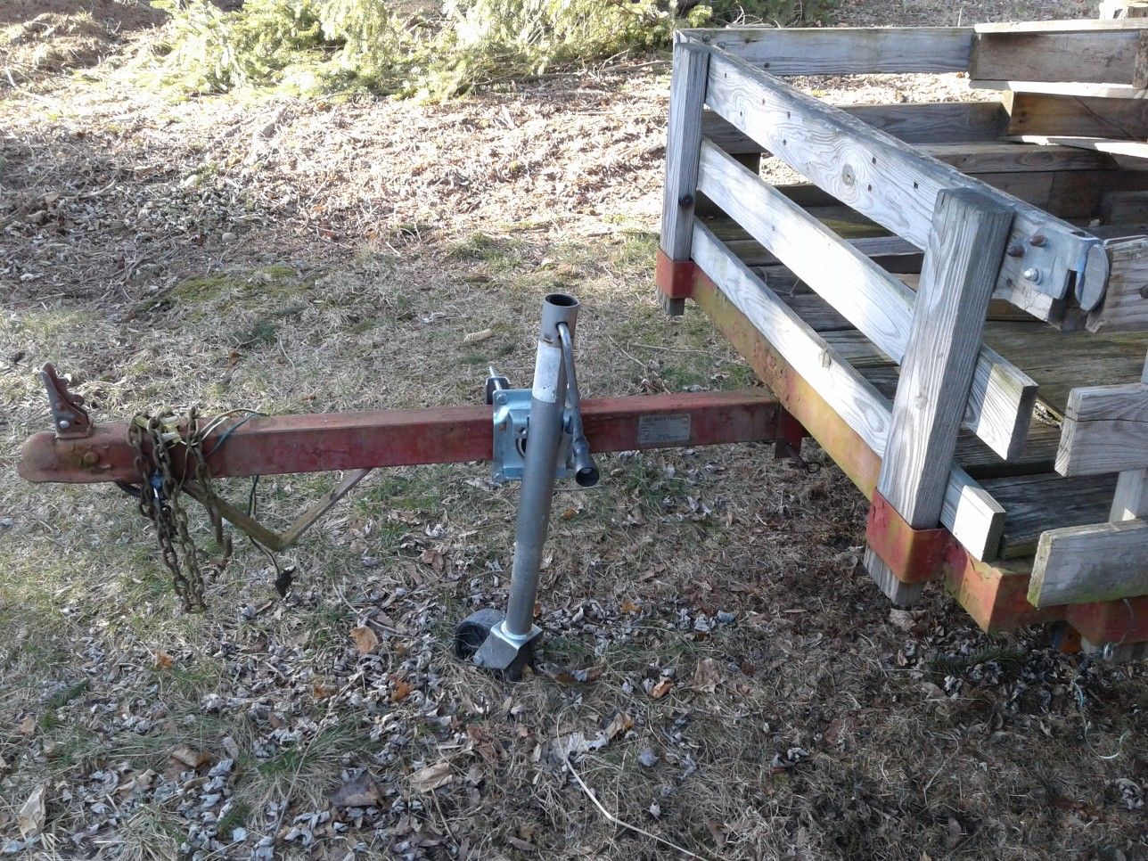 Utility trailer. Tips up to load ride-on mower etc. No title since it is homemade.