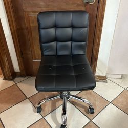 1 Chair Swivels On Wheels