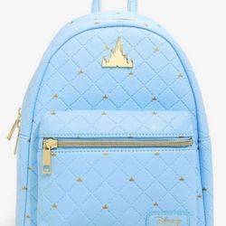 Loungefly Disney Cinderella Castle Blue Quilted Mini Backpack - NWTs  Loungefly Disney Castle Blue mini backpack.  The back pack is pale blue embossed