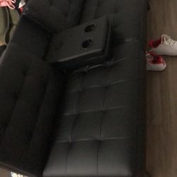 BLACK LEATHER FUTON BASICALLY BRAND NEW $60 FIRM 