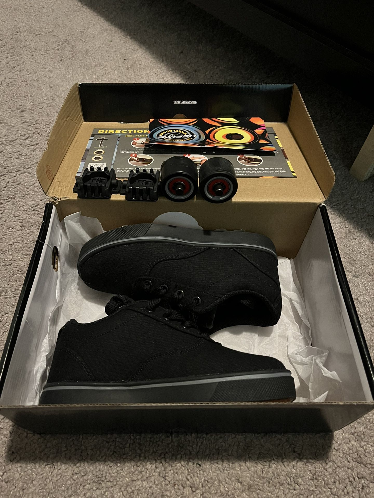 BRAND NEW, NEVER BEEN USED size 13 youth ALL BLACK HEELYS