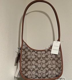 Coach Curve Zip Bag in Signature Jacquard crystals