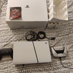 2 Month Old PS5 With Box.  Free Spiderman 2 Game And Two Controllers. Great Condition Like New.