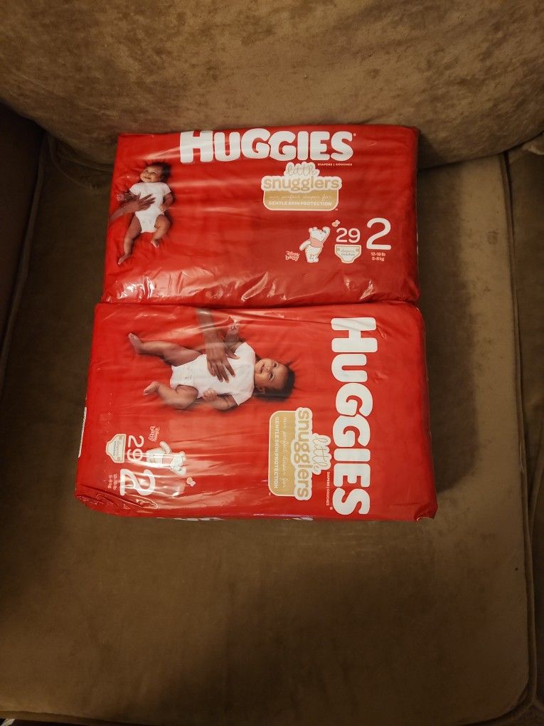 2 Packs HUGGIES Diapers Sz 2 (12-18lbs) 29 Per Pack