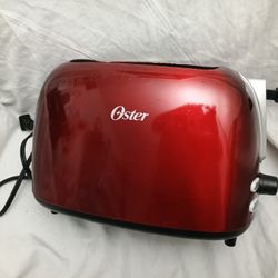 RED OSTER 2 SLICE BREAD TOASTER
