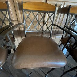 Three beautiful 32” metal swivel barstools originally purchased from the Stool and Dinette Factory