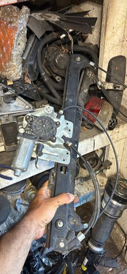 04 bmw X5 front right window regulator