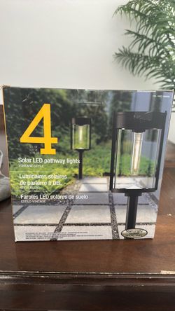 Brand new 4 pack solar ked pathway lights