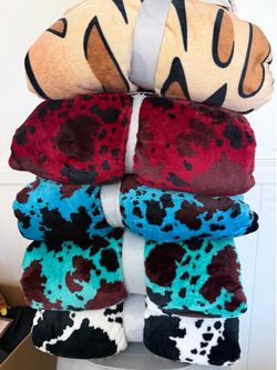 Cow and leopard print fleece blanket