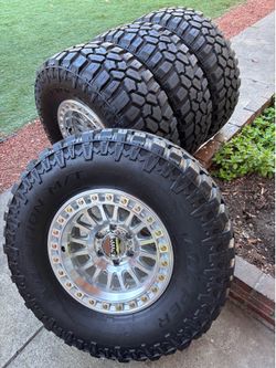 KMC ISM wheels new on like new copper tires 315/70/17