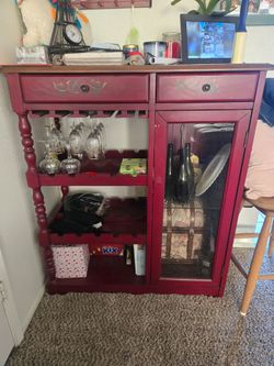 Wine rack $ 75  Burgundy color  48 tall,39 wide, 17 deep